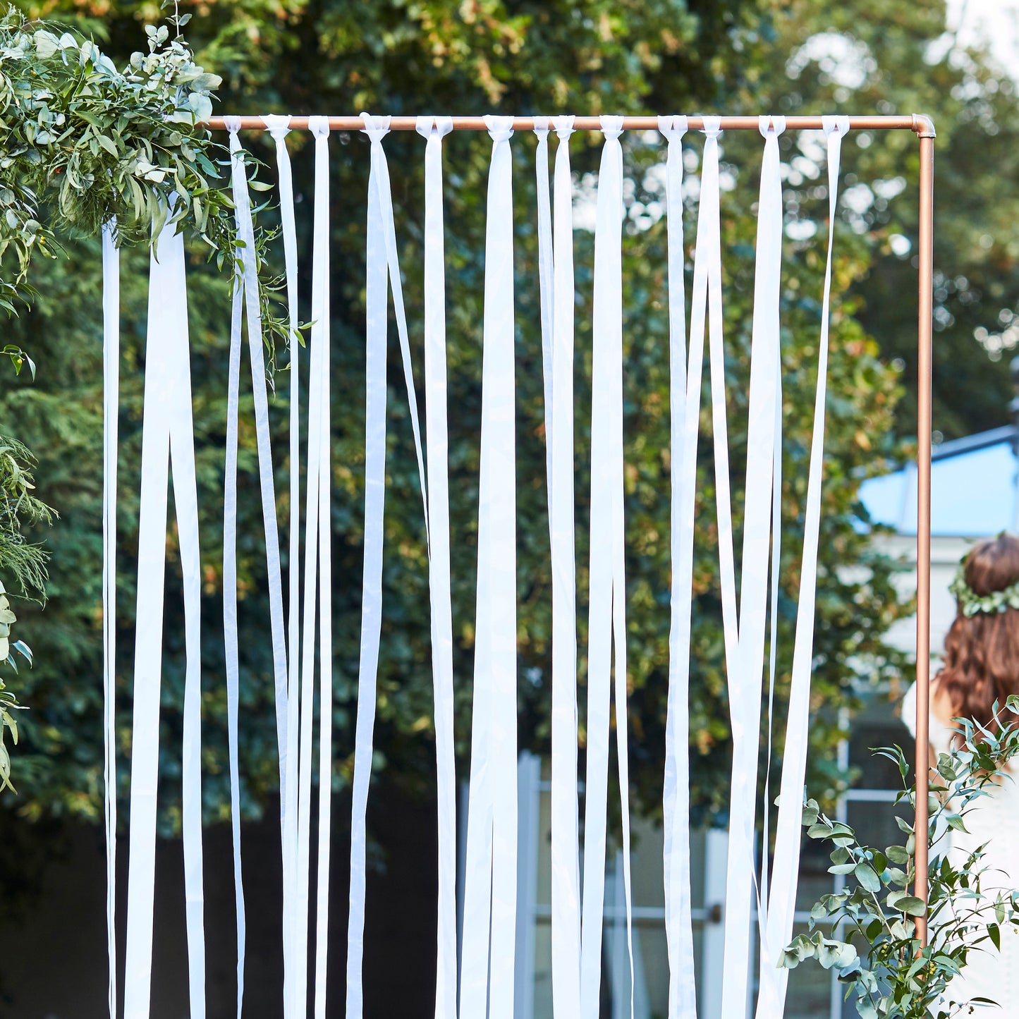 White Ribbon Hanging Wedding Backdrop
