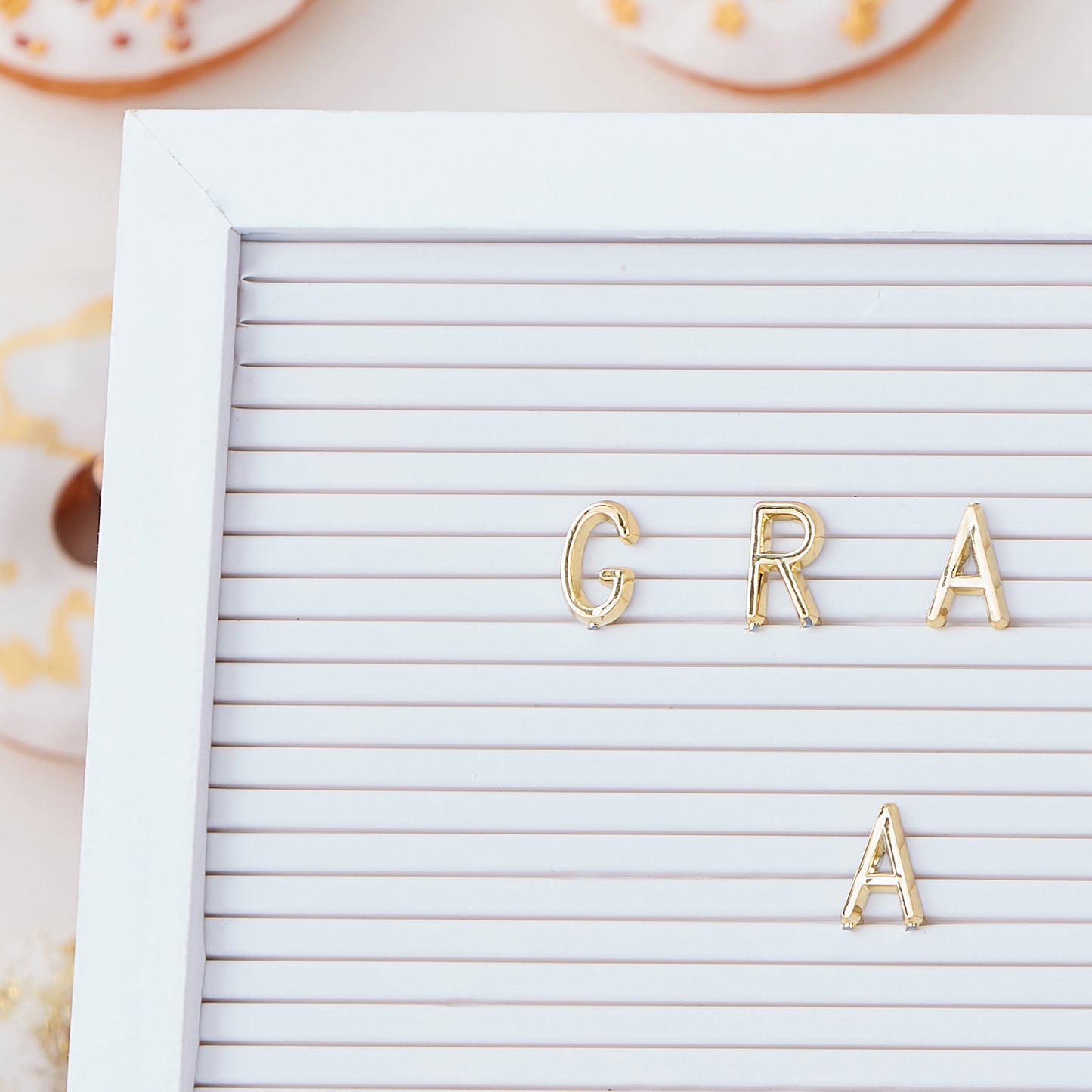 White and Gold Peg Letter Board