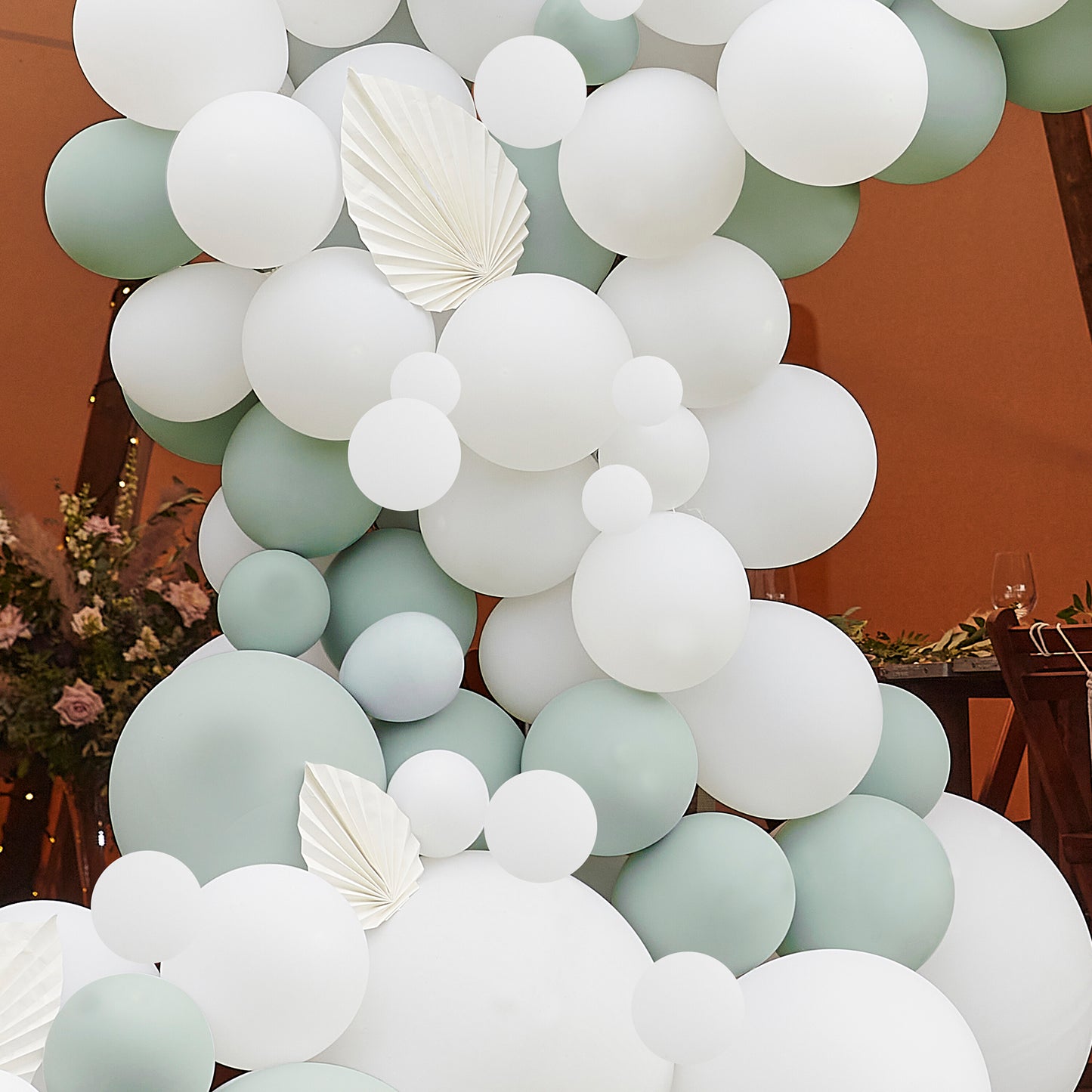 Luxe Sage & White Balloon Arch with White Fans