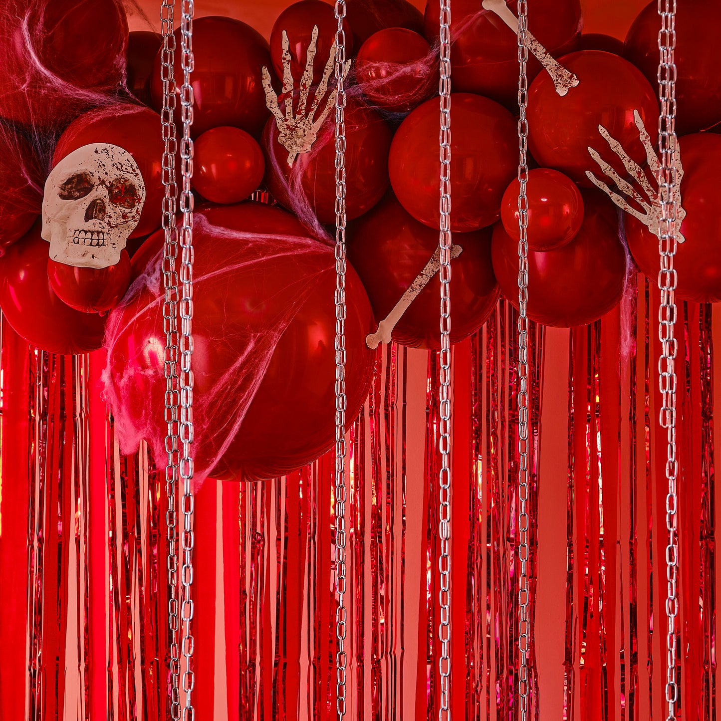 Red Halloween Balloon Arch with Streamers, Card Bones & Skulls