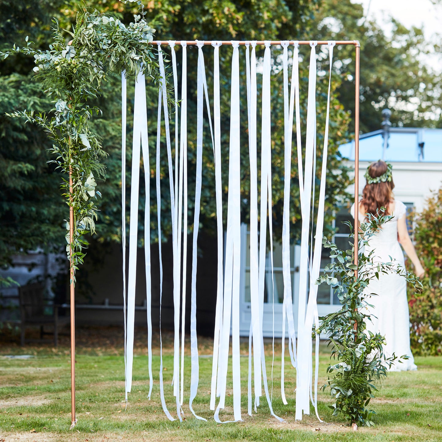 White Ribbon Hanging Wedding Backdrop