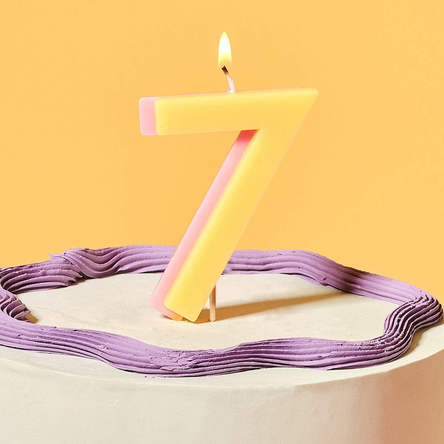 Yellow and Pink Number 7 Candle